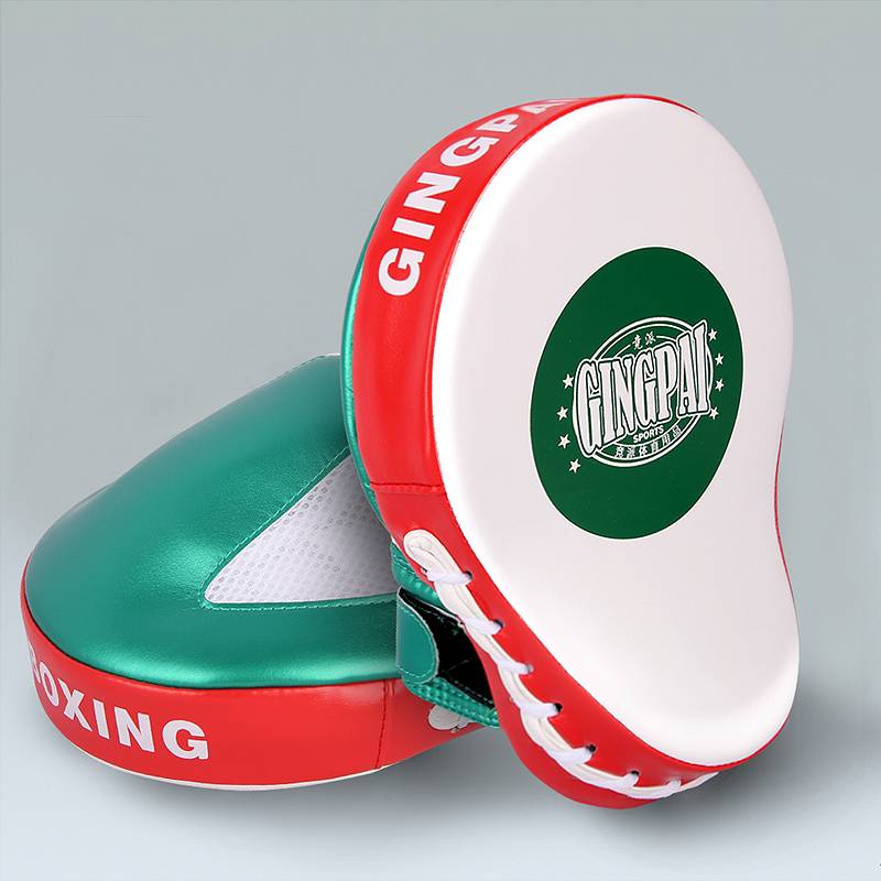 Coach's got a white and green target